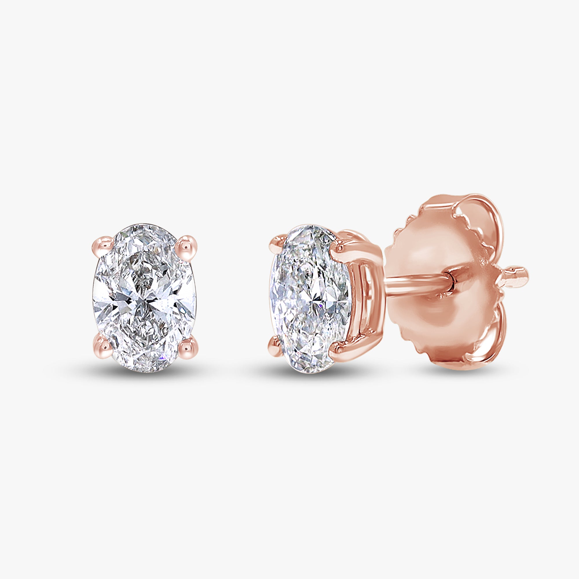 0.95 Carat Oval Cut Lab Grown Diamond Solitaire Stud Earrings