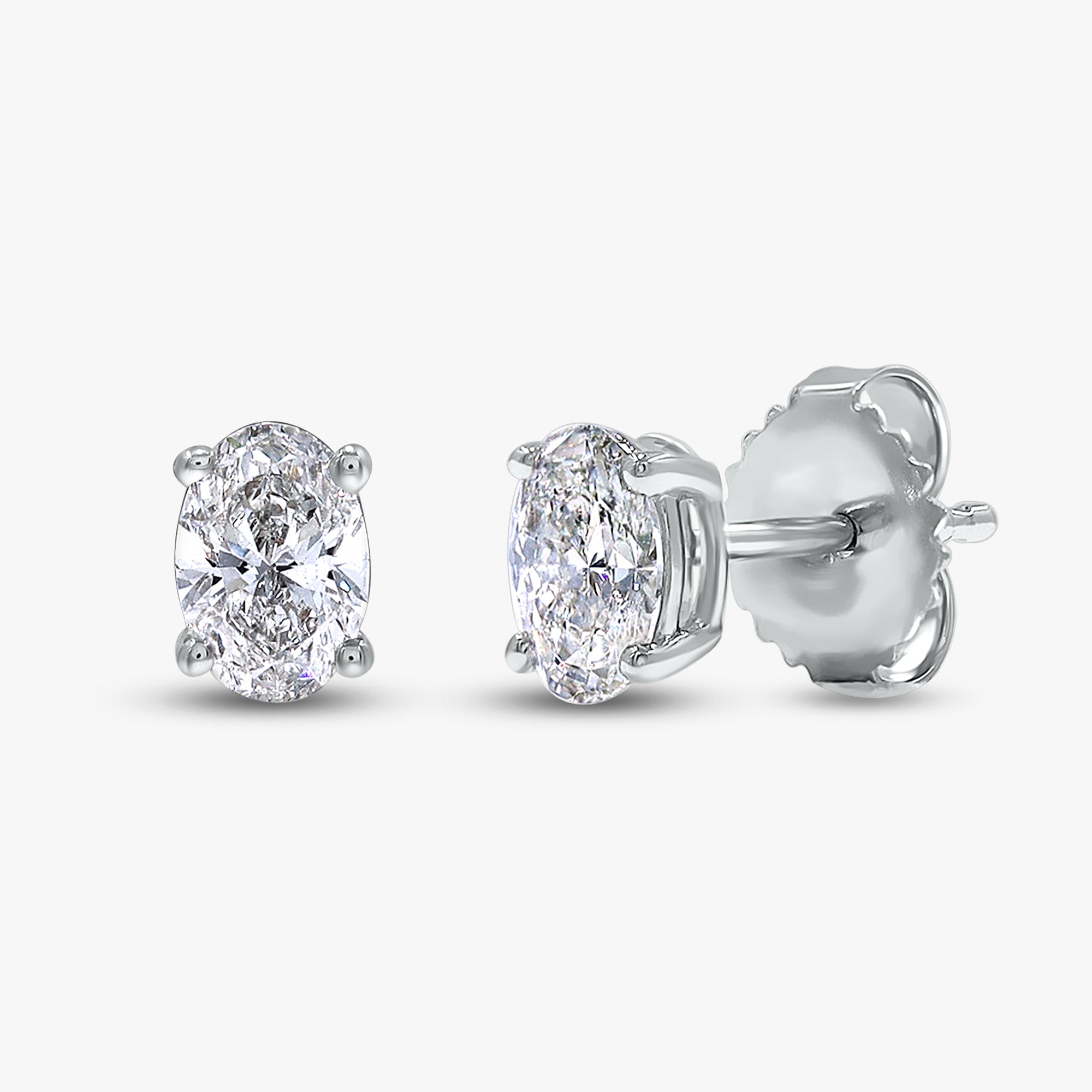 0.95 Carat Oval Cut Lab Grown Diamond Solitaire Stud Earrings