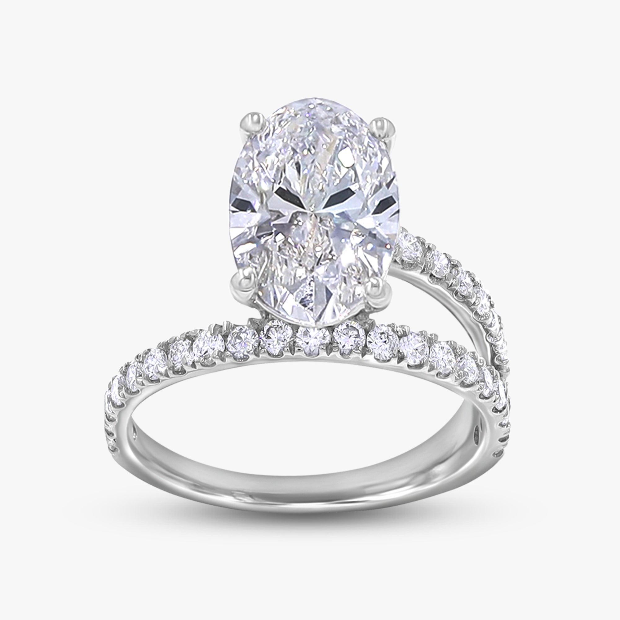 Oval and Round 3.55 Carat Lab Grown Diamond Bypass Rings