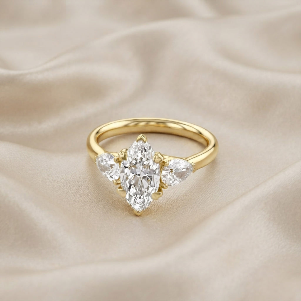 3.20 Carat Marquise and Pear Lab Grown Diamond Three Stone Ring