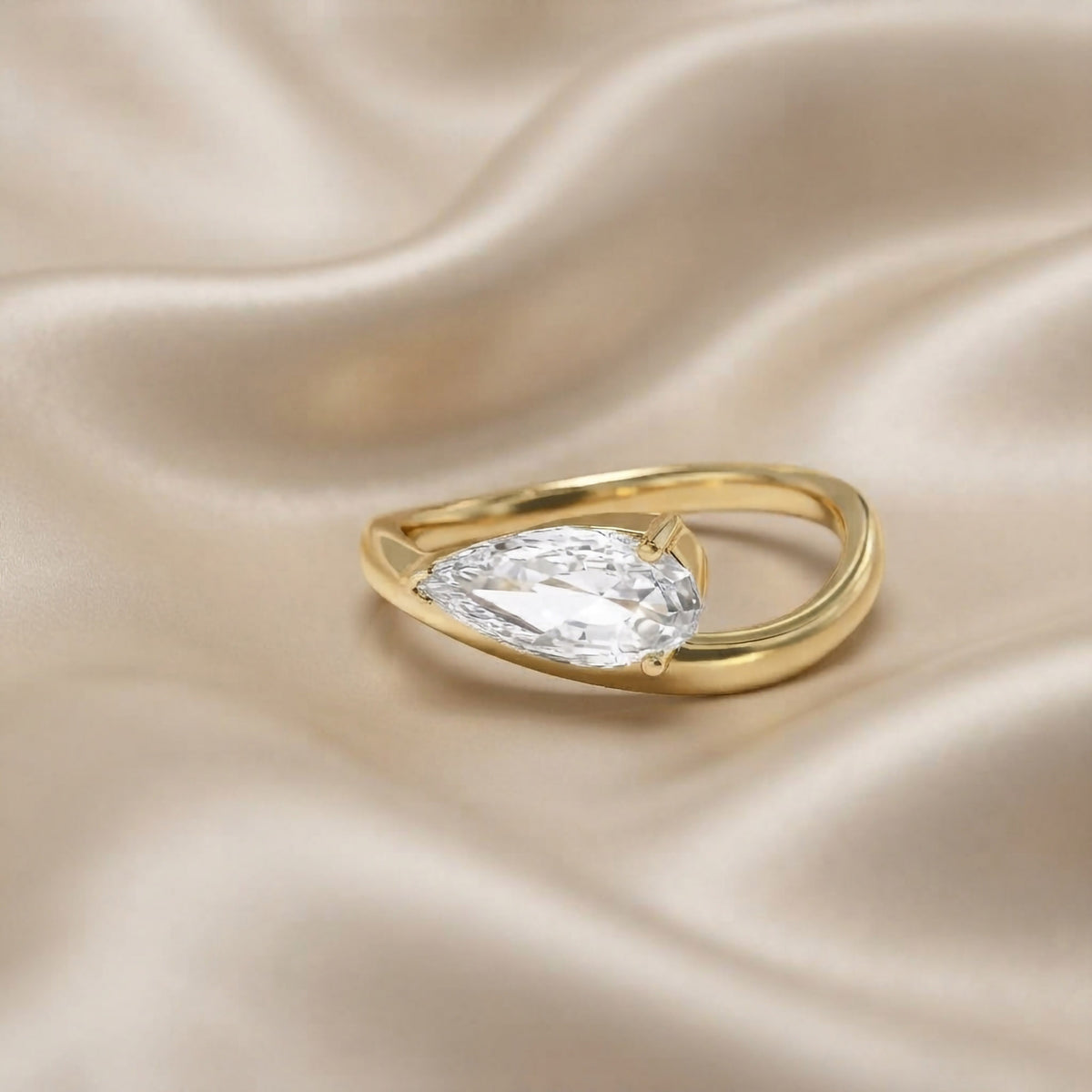 1.15 Carat Pear Shape Lab Grown Diamond Swirl Solitaire Ring