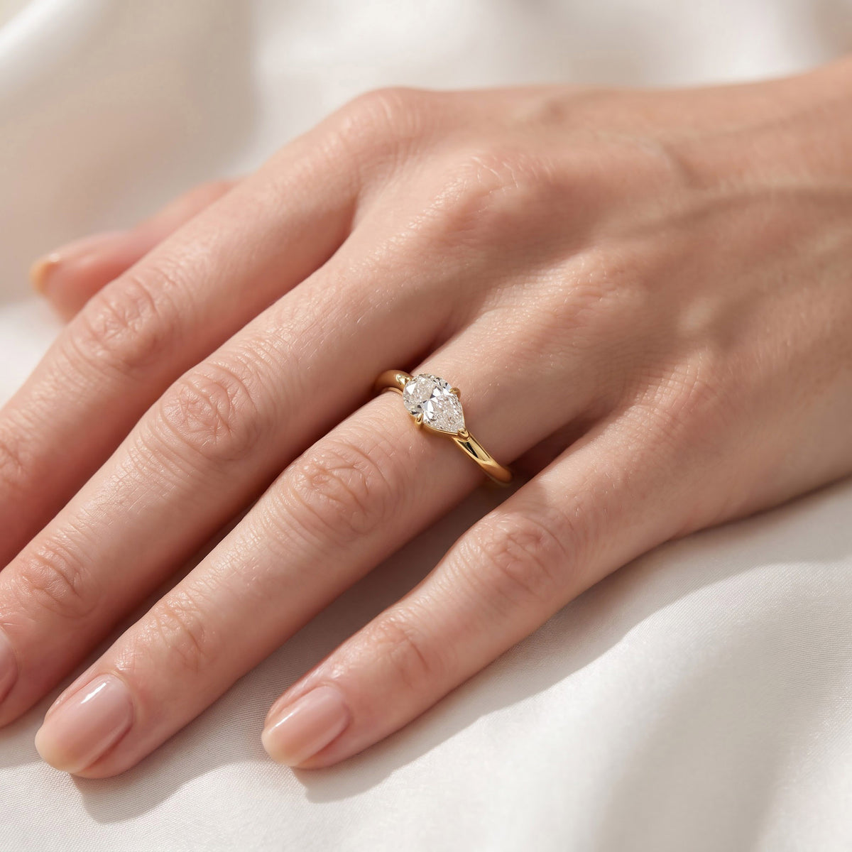 1.00 CTW Pear Cut Lab Grown Diamond Wave Ring