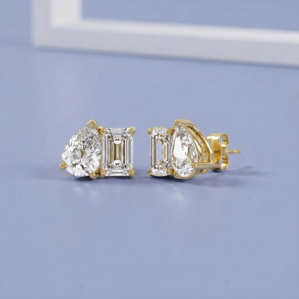 2.77 Carat Emerald and Pear Shape Lab Grown Diamond Toi et Moi Stud Earrings