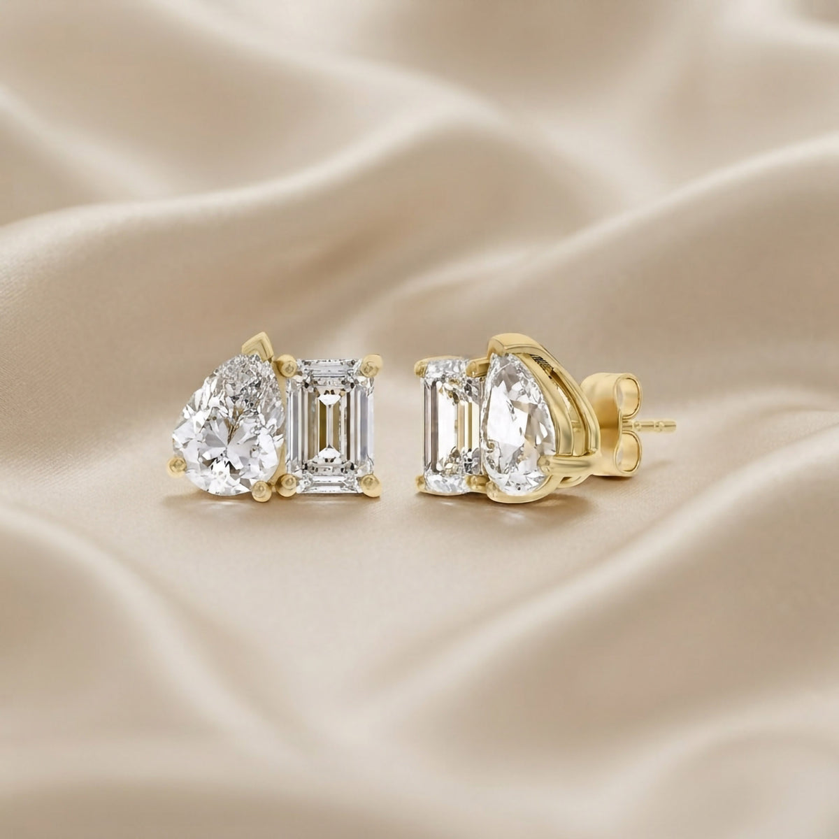 2.77 Carat Emerald and Pear Shape Lab Grown Diamond Toi et Moi Stud Earrings