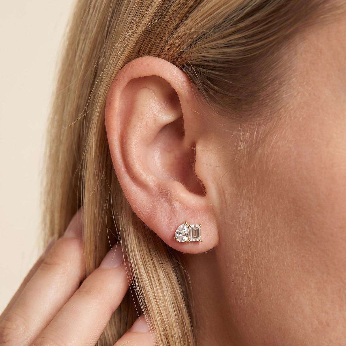 2.77 Carat Emerald and Pear Shape Lab Grown Diamond Toi et Moi Stud Earrings